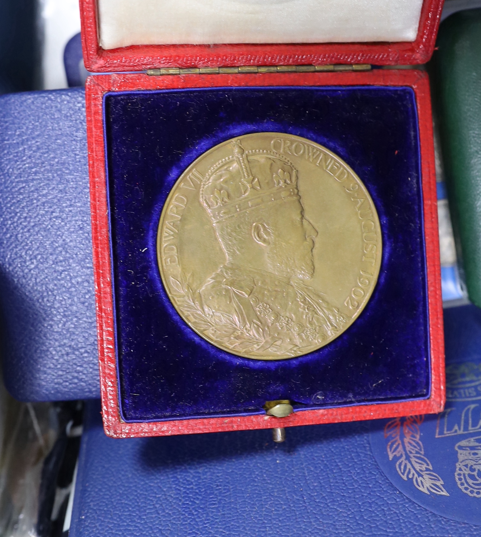 George V to QEII coins and medals, including two BUNC coronation year sets, 1953, a Masonic medal, Edward VII bronze coronation medal, Royal Mint HM royal palace and fortress of the Tower of London medal, 1977 silver jub